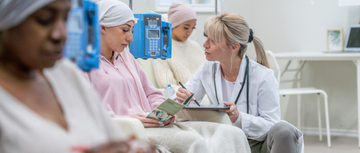 oncology pharmacist at work with patients