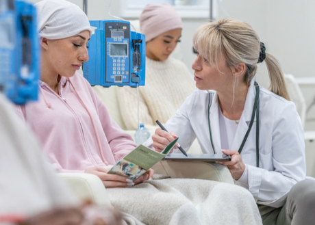 oncology pharmacist at work with patients