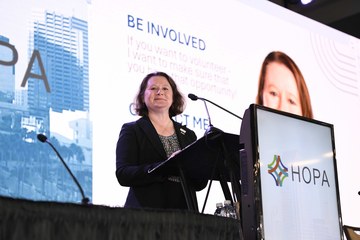 Jolynn Sessions giving her incoming president's address at HOPA