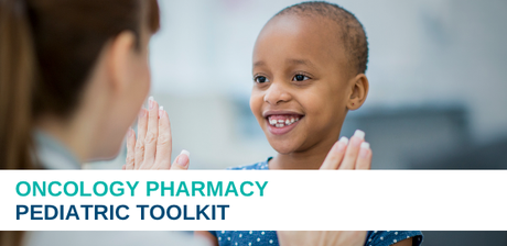 child with cancer smiling at care provider